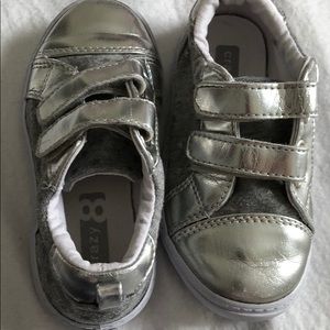 Silver shiny sneakers with Velcro snaps and stars